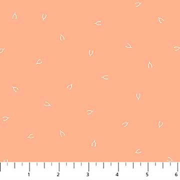 a Lucky Charms Basics - Wishbone - Coral fabric with white leaves on a ruler by Figo.
